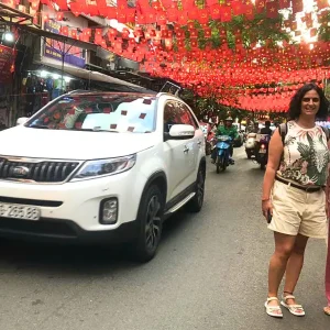Passengers get dropped off at a Hanoi City hotel